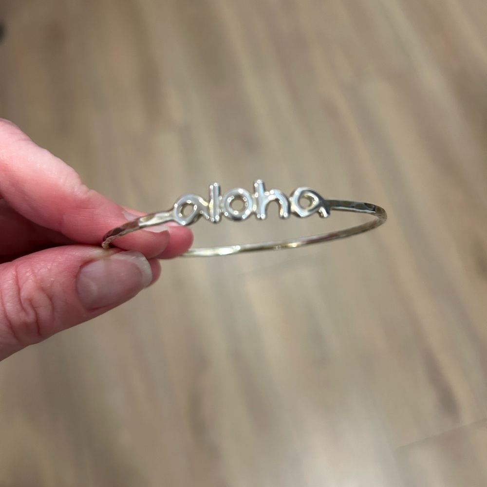 Silver ‘Aloha’ bangle bracelet
